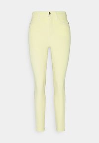 Jeans ajustados en un color amarillo claro, hechos de mezclilla, con una cintura alta, bolsillos frontales y una cremallera con un botón de metal.