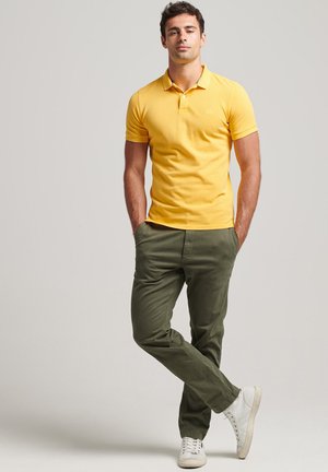 Polo - springs yellow