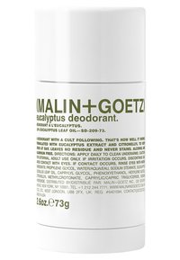 Eukalyptus-Deodorant in einer weißen zylindrischen Tube mit einem grünen Etikett, das Text enthält. Größe 2,6 oz / 73 g am unteren Ende angegeben.