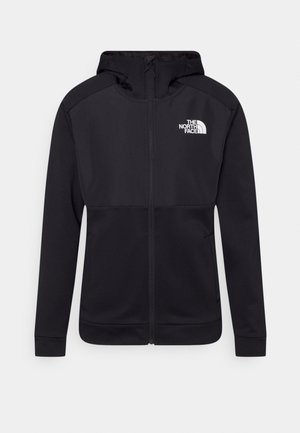 Czarna, w pełni rozpinana kurtka z kapturem i długimi rękawami, przednie kieszenie oraz białe logo "The North Face" na lewej piersi.