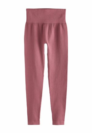 Ribbed Leggings in einem staubigen Rosaton, mit einem breiten Bund und einem figurnahen Design, das bis zur Knöchellänge verläuft. Hergestellt aus weichem, dehnbarem Material.