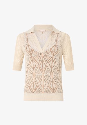 Pullover in maglia color beige con un motivo in pizzo, maniche corte e scollo a V. Presenta un filato testurizzato e un colletto a coste.