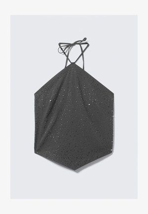 Grauer Haltertop mit einer hexagonalen Form, das eine strukturierte Oberfläche mit kleinen reflektierenden Details und dünnen, überkreuzten Trägern aufweist.