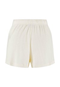 Shorts tricotés de couleur crème avec une ceinture élastique et de subtils motifs texturés verticaux sur le tissu.