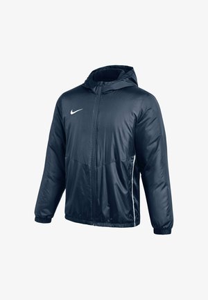 Mørkeblå Nike hættetrøje med fuld lynlås foran, elastiske manchetter og hvidt logo på venstre bryst, vist mod hvid baggrund.