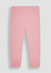 Rózsaszín bordázott leggings, elasztikus derékkal és cuffolt bokákkal, puha anyagból, a kényelem és a mozgás szabadsága érdekében.
