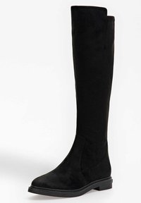 Knee-high mustat mokkanahka saappaat, joissa on sileä pinta, pyöreä kärki ja litteä kumipohja. Ominaisuuksiin kuuluu paneelimuotoilu varsien varrella.