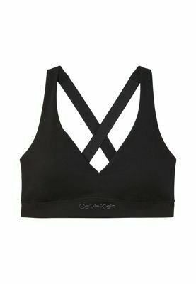 Schwarzer Sport-BH mit gekreuzten Trägern am Rücken und Calvin Klein Logo auf dem vorderen Bund.