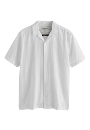 Next, Pluus - white stripe
