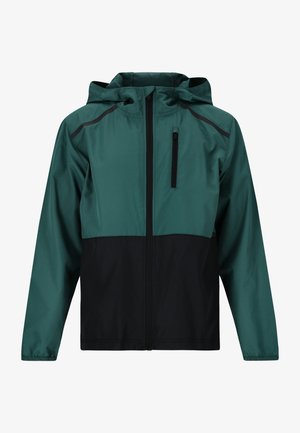 Giacca con cappuccio caratterizzata da una parte superiore color teal e una parte inferiore nera, realizzata in materiale leggero. Include una tasca sul petto con zip e cuciture a contrasto.