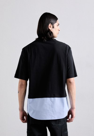 MOSCHINO T-shirt imprimé - fantasia nero