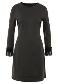 Grå långärmad klänning i mjukt material, med rund halsringning och svarta tylldetaljer vid ärmsluten. Skärning som sitter tajt.