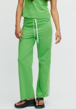 FLAVIA - Pantaloni de trening - green