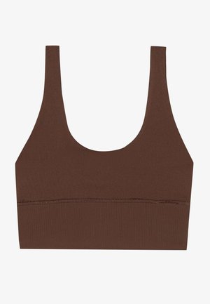 Brun, skoptopp med brede stropper og en glatt, elastisk tekstur. Har et sømløst design med forsterket kant.