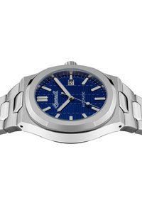 Roestvrijstalen automatische horloge met een blauw patroon op de wijzerplaat, zilveren uurmarkeringen en een datumaanduiding op 3 uur. Metalen armband met sluiting.