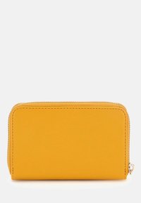 Yellow leather wallet with a smooth texture, zip closure, and precise stitching. Minimalist design with no visible patterns or accents.