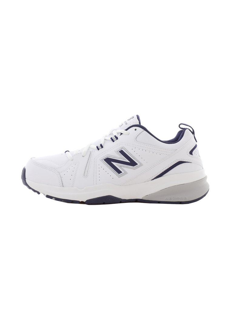 White and navy New Balance athletic sneaker with lace-up closure and cushioned sole, side view on a white background.
