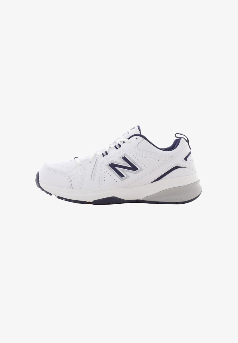 White and navy New Balance athletic sneaker with lace-up closure and cushioned sole, side view on a white background.