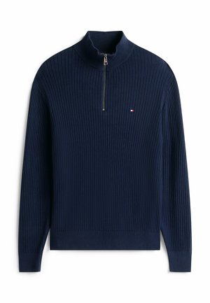 Maglione a coste di colore blu navy con maniche lunghe, colletto a mezza zip e piccolo logo rosso, bianco e blu sul petto.