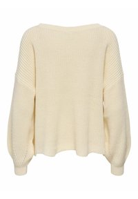 Pull en tricot couleur crème avec épaules tombantes et manches longues bouffantes, vu de dos sur fond blanc.
