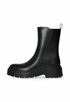 Stivaletti con plateau