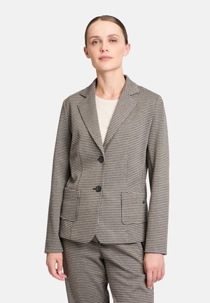 Blazer à carreaux gris en tissu texturé avec un revers cranté, deux boutons et poches avant. Assorti avec un costume coordonné.