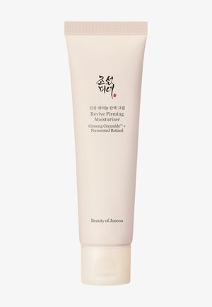 Revive Firming Moisturizer Tube mit Ginseng-Ceramid und fermentiertem Retinol von Beauty of Joseon, hellbeige Verpackung mit koreanischem und englischem Text.