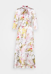 Robe longue et ajustée avec un tissu blanc orné d'un motif abstrait coloré en rose, or et rouge. Encolure haute avec un détail nœud.