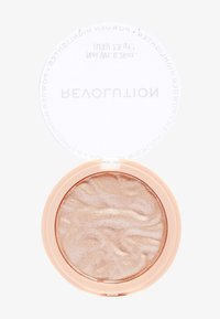 Highlighter en poudre avec une texture marbrée en doré clair. Compact circulaire avec un couvercle transparent et une base de couleur pêche douce.