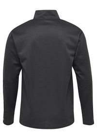 Giacca nera a maniche lunghe con superficie texturizzata e colletto alto. Presenta un design aderente e dettagli a pannello discreti sulle maniche.