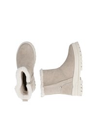 Beige Wildleder-Ankle Boots mit einem Kunstfellkragen und einer dicken weißen Gummisohle. Sie verfügen über einen seitlichen Reißverschluss und eine strukturierte Oberfläche für zusätzlichen Halt.