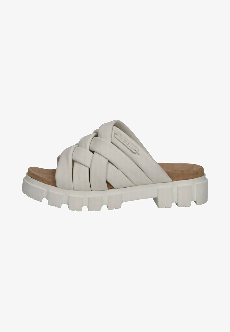 White slide sandal with woven straps, rubber sole, flat design, and textured footbed. Logo detail visible on one strap.