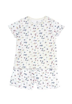 Ensemble de pyjama floral en blanc, présentant des manches courtes et des ourlets volantés. Le haut a un col rond avec un motif de petites fleurs colorées.