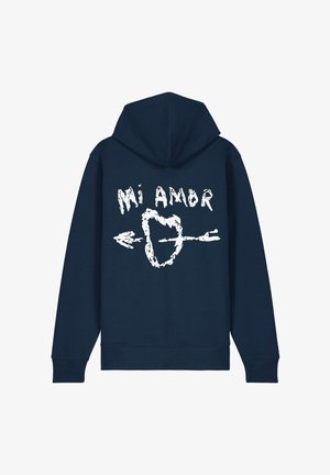 Hoodie bleu marine avec un graphique blanc dans le dos représentant le texte "Mi Amor" et un cœur avec une flèche. Matière en mélange de coton, coupe décontractée.