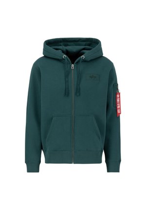 Sudadera con capucha y cremallera en verde azulado oscuro, con un parche de logo en el frente, bolsillos tipo canguro y una etiqueta roja en la manga. Material de mezcla de algodón.