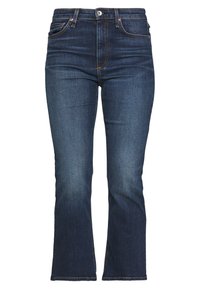 Jeans de mezclilla azul oscuro con cintura alta, piernas ligeramente acampanadas y diseño clásico de cinco bolsillos. Presentan costuras en contraste y herrajes metálicos.