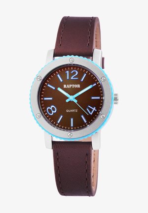 Brown quartz watch with a silver case, blue accents, and a brown leather strap. Features bold, contrasting hour markers and hands.
