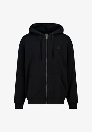 Black zip-up hoodie made of cotton blend, featuring a front pocket, drawstrings, and a small logo patch on the left chest.