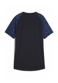 Laivastonsininen lyhythihainen paita, jossa on geometriset siniset kuviolaatat olkapäissä. Sileä kangas, pyöreä kaula-aukko ja hieman kaareva helma alaosassa.