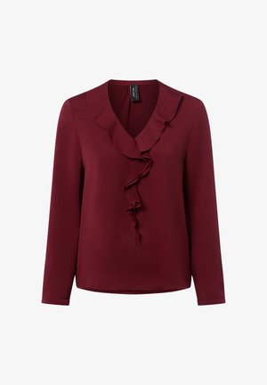 Burgunderfarbene Bluse mit langen Ärmeln, V-Ausschnitt und Rüschendetail an der Vorderseite. Hergestellt aus glattem Stoff mit lockerer Passform und abgerundetem Saum.