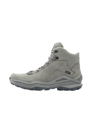 Light gray mid-height hiking boot with lace-up front, perforated side panel, Gore-Tex label, and chunky outsole for traction.
