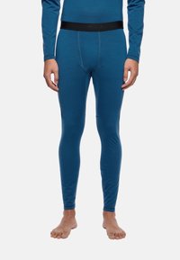 L'intimo lungo blu realizzato in un tessuto morbido, con una vita elastica nera, una vestibilità aderente e una superficie liscia.