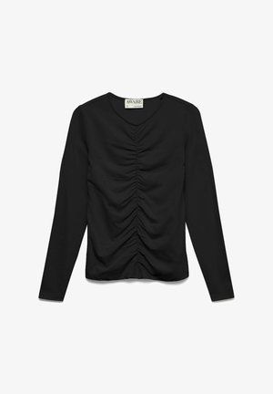 Črna majica z dolgimi rokavi z nagubanimi detajli po sredini spredaj in z okroglim izrezom, na kateri je napis "AWARE."