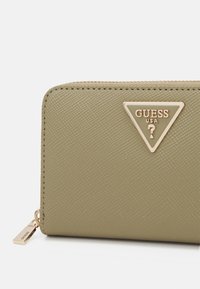 Guess LAUREL MEDIUM ZIP AROUND - Portemonnee - sage