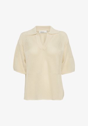 Beez, lühikeste varrukatega polo-sweater V-kaelusega, valmistatud tekstuurse kudumiga, millel on diagonaalsed mustrid, pehme krae ja lõdvestatud lõige.