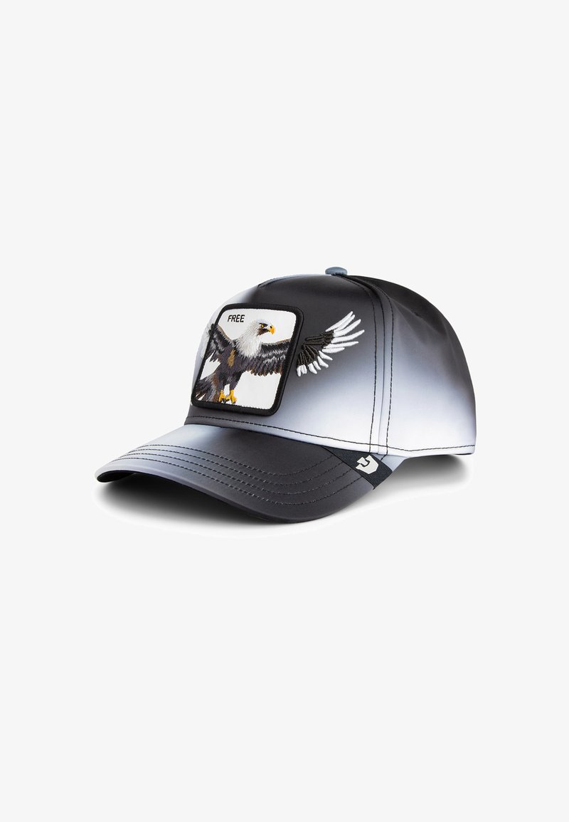 Gorra de béisbol en degradado negro y gris con un parche bordado de un águila y la palabra "LIBRE" arriba. Tela suave y diseño de visera curva.