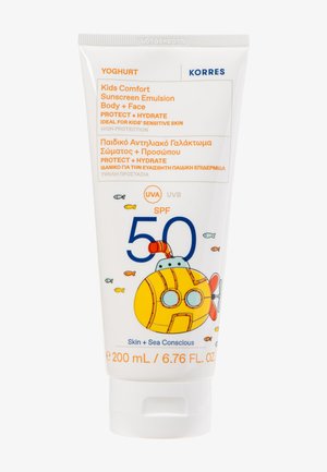 Kids Comfort zonnebrandemulsie SPF 50 voor lichaam en gezicht, met illustraties van een gele duikboot en kleine vissen op de witte tube.