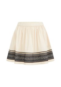 Hame cream-värissä, joka on valmistettu kevyestä kankaasta, jossa on kerätty vyötärö ja musta geometrinen kirjonta helman reunassa.