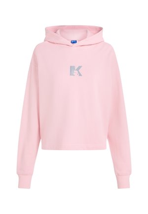 Hoodie court rose clair à manches longues avec un logo "K" argenté sur la poitrine, présentant une silhouette de lapin à l'intérieur de la lettre.