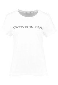 Bílá bavlněná tričko s krátkým rukávem, s nápisem "CALVIN KLEIN JEANS" tištěným tučnými šedými písmeny přes hrudník. Klasický kulatý výstřih.